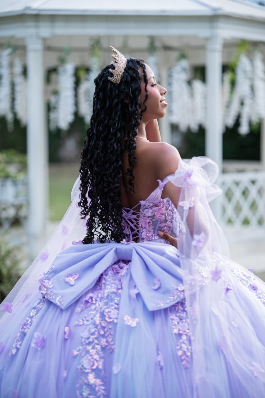 Quinceañera in a lavender ballgown at her grand entrance