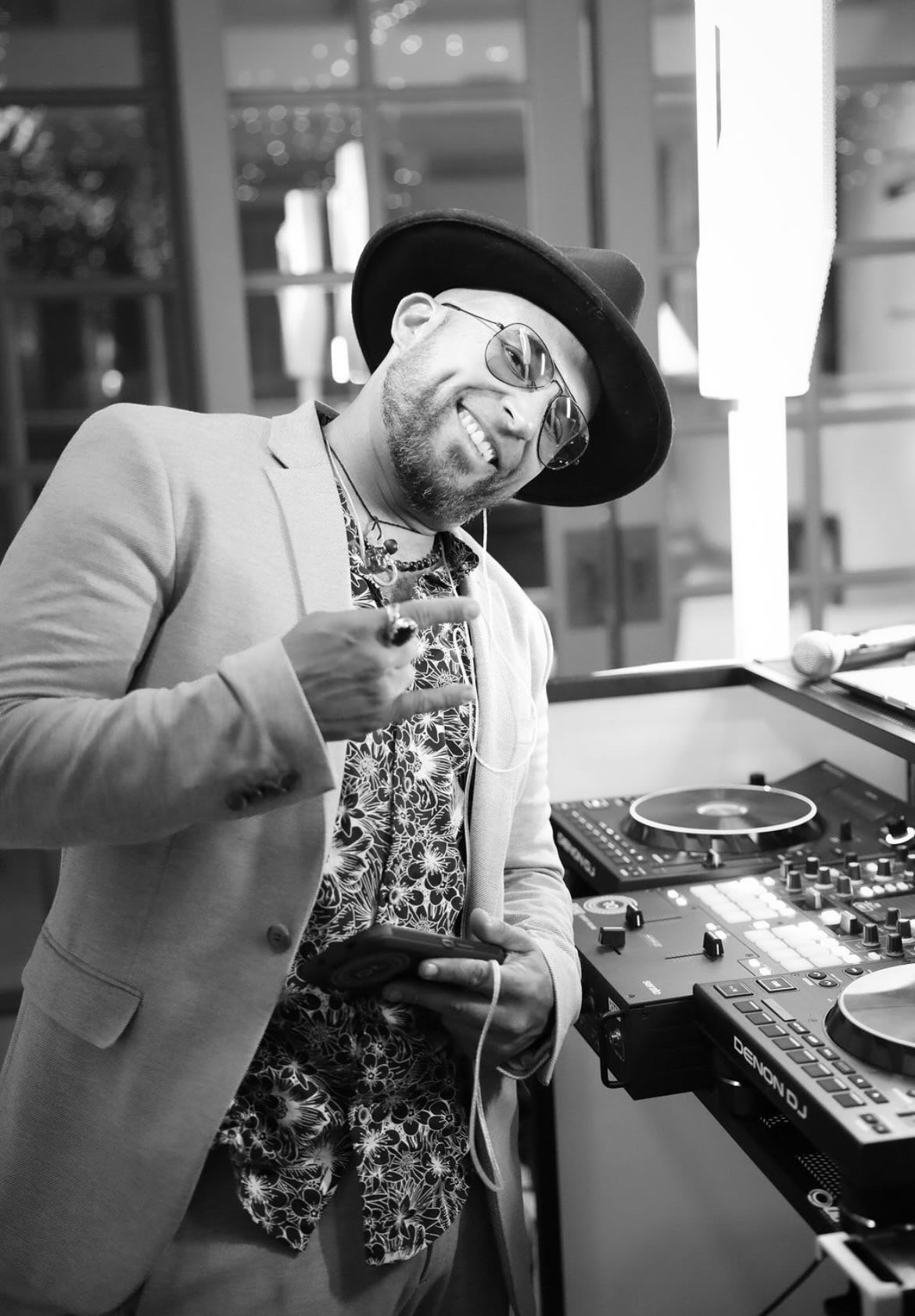 RO, founder and music director of Magin Productions, at the decks